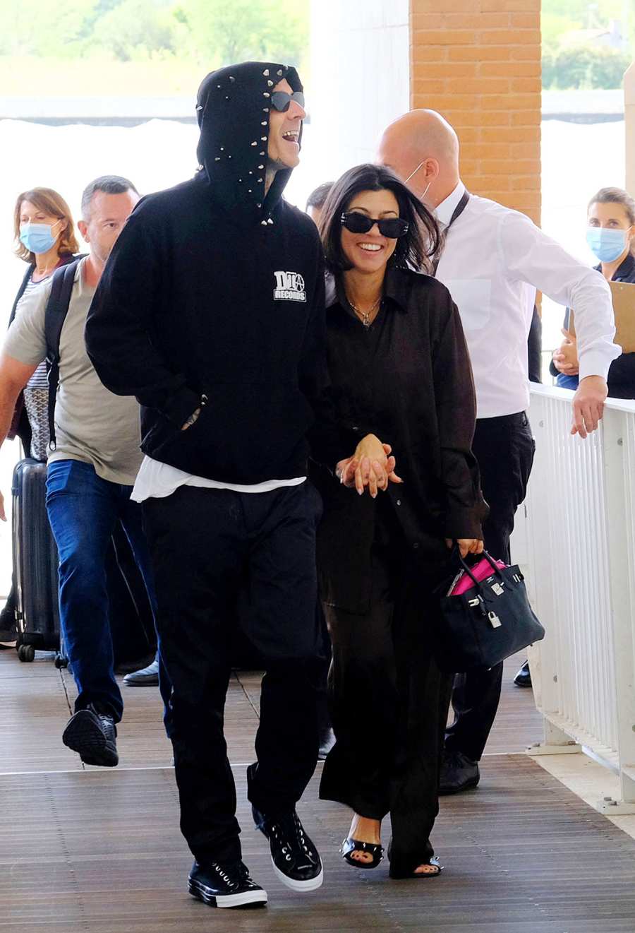 Kourtney Kardashian Travis Barker Italy Style Is All About Color Coordination