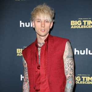 Machine Gun Kelly Shaves His Head Debuts the Craziest Scalp Tattoo Red Vest Red Pants