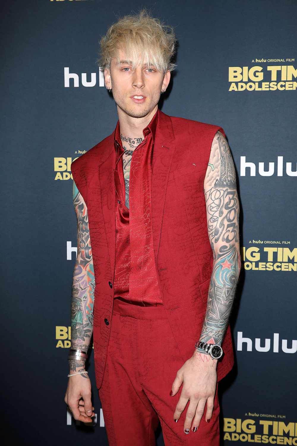 Machine Gun Kelly Shaves His Head Debuts the Craziest Scalp Tattoo Red Vest Red Pants