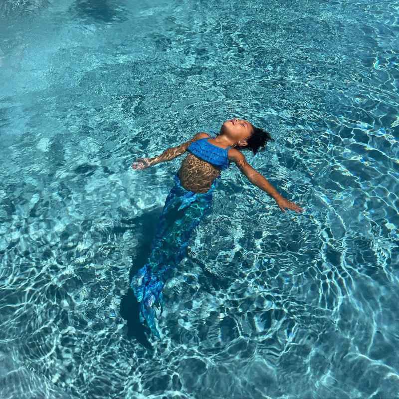 See Kylie Jenner’s Daughter Stormi Swimming With Mermaid Tail