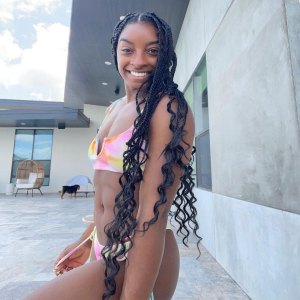 Simone Biles Enjoys Pool Day in Tie-Dye Bikini