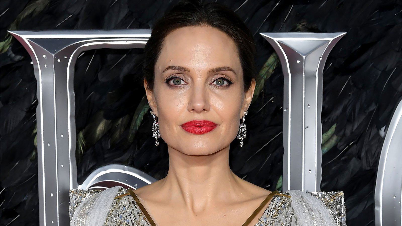 Angelina Jolie Shares Rare Personal Photos of Kids Zahara and Shiloh Reading