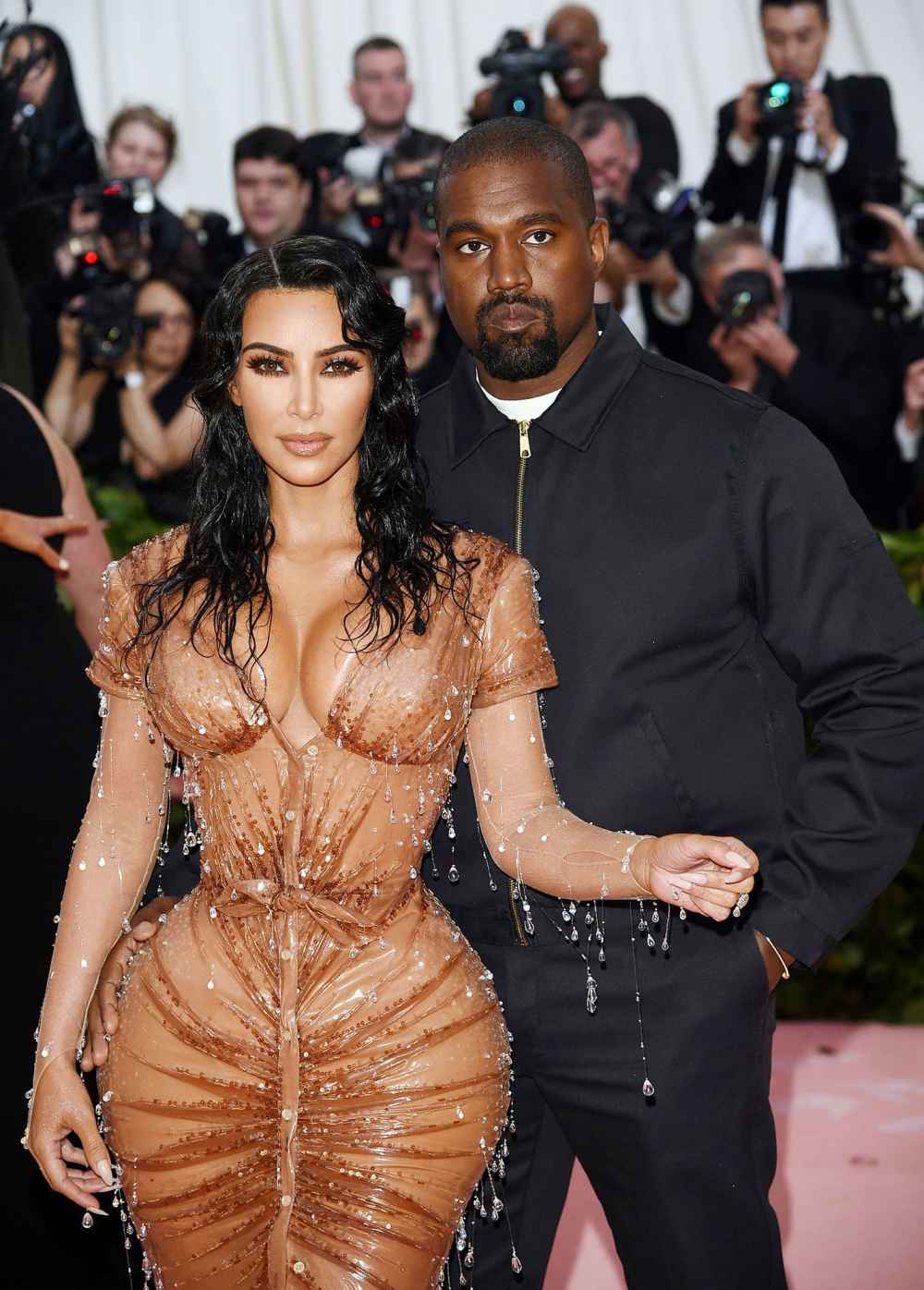 Kanye West Follows Kim Kardashian Again Amid Divorce, Cheating Rumors –  StyleCaster