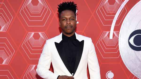 Leslie Odom Jr poses on the red carpet at the Tony Awards