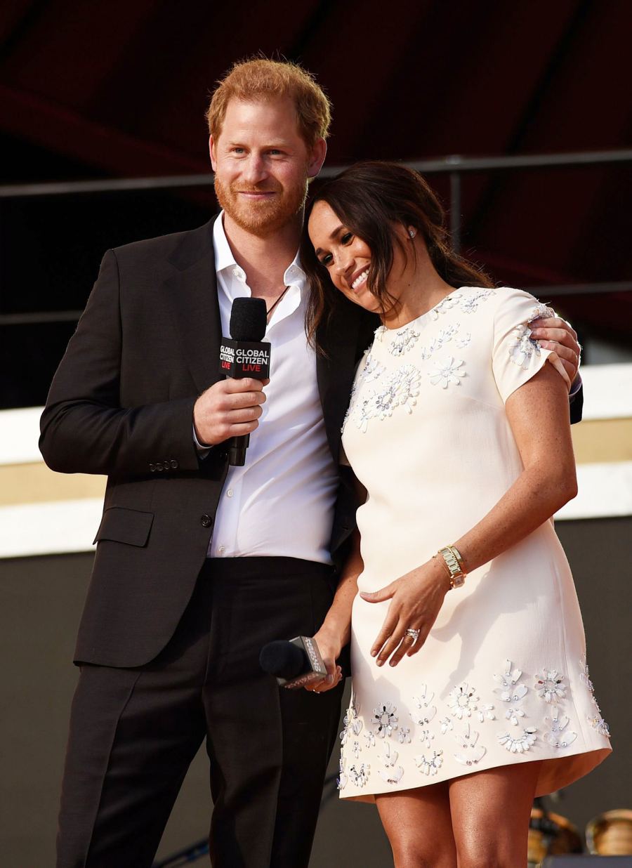 Meghan Markle leans on Prince Harry at Global Citizen