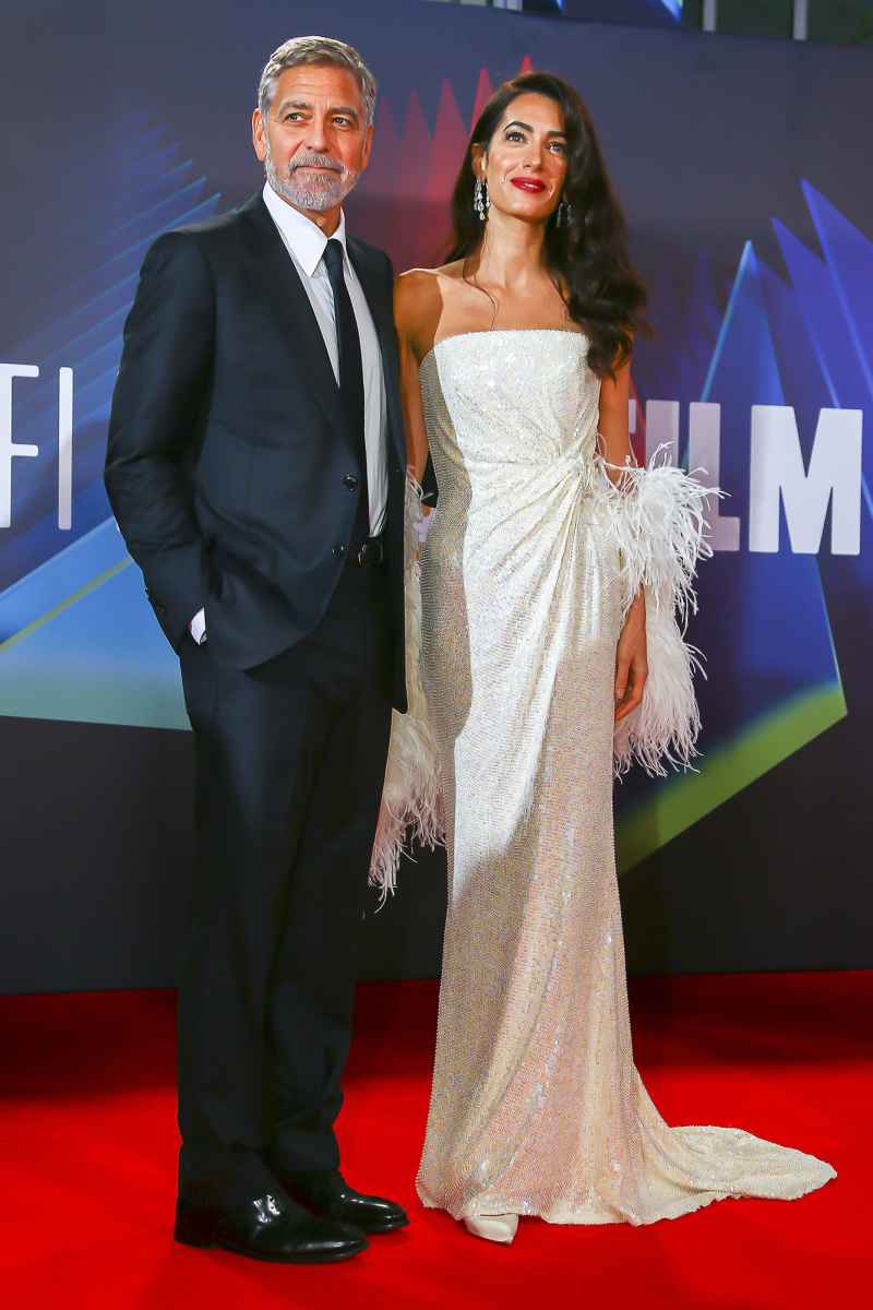 George Clooney Helps Wife Amal Avoid Major Wardrobe Malfunction at Tender Bar Premiere 10