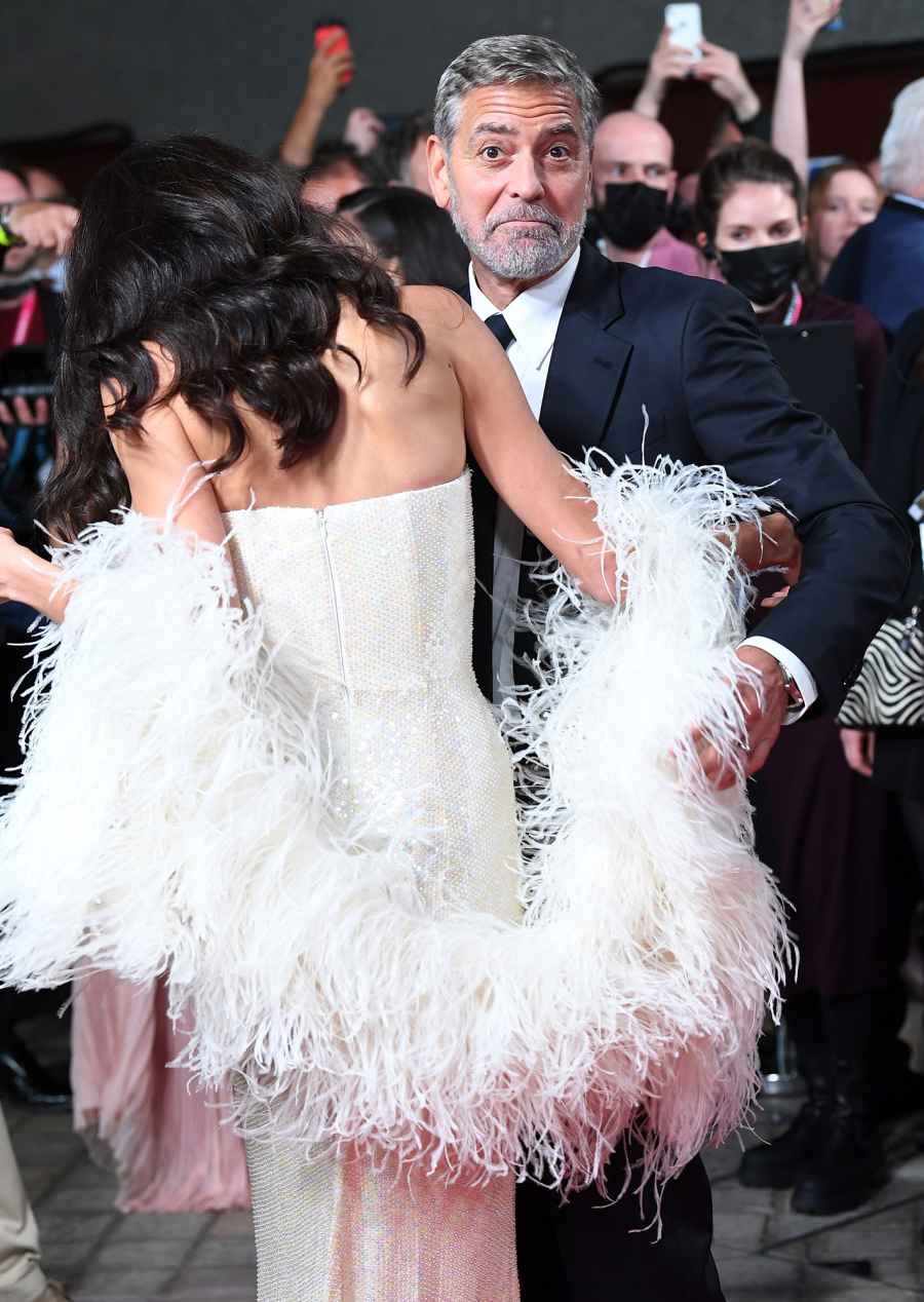 George Clooney Helps Wife Amal Avoid Major Wardrobe Malfunction at Tender Bar Premiere 3
