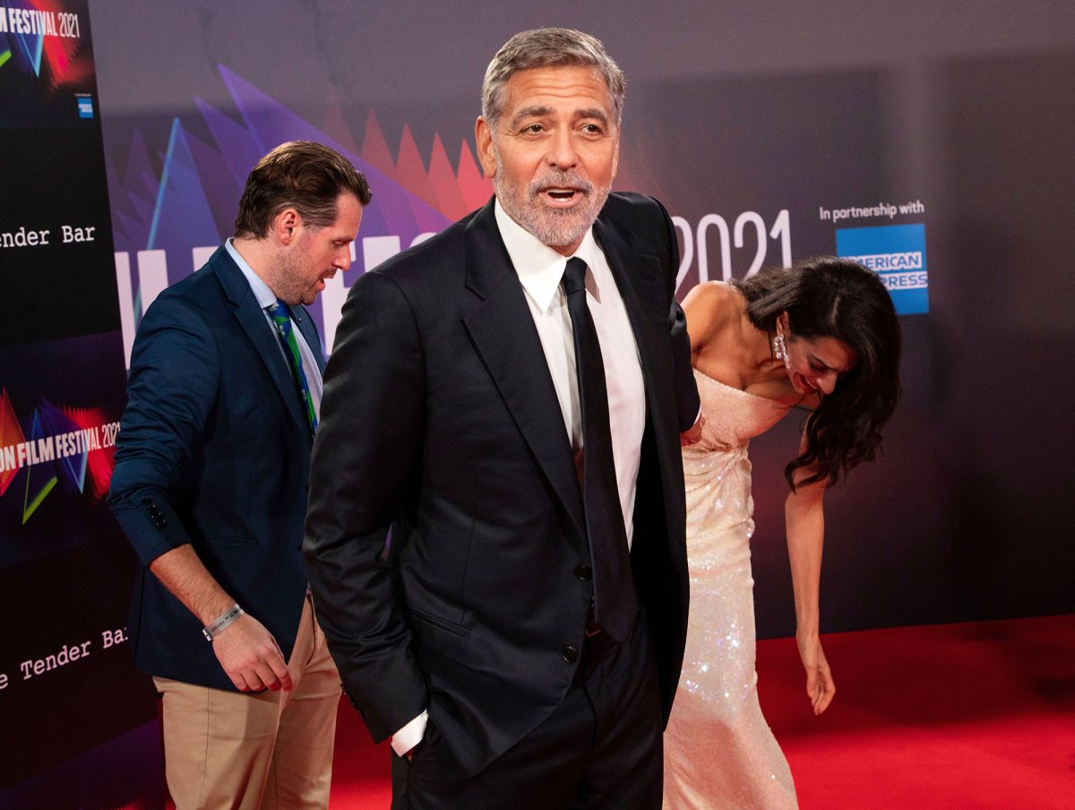 Clooney Helps Amal Avoid Wardrobe Malfunction on Red Carpet Us
