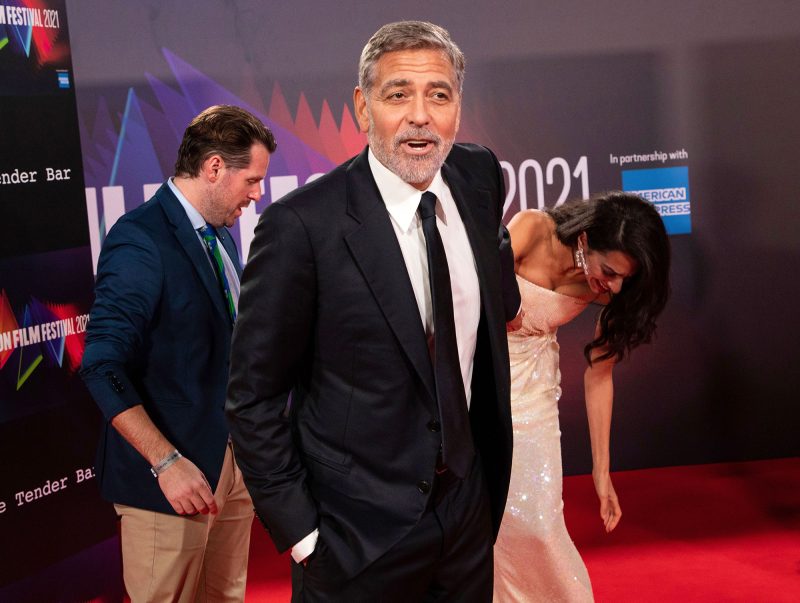 George Clooney Helps Wife Amal Avoid Major Wardrobe Malfunction at Tender Bar Premiere 7