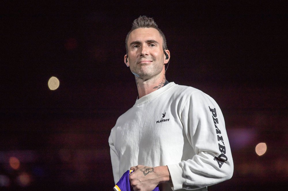 How Adam Levine Reacted to Maroon 5 Fan Rushing the Stage to Hug Him
