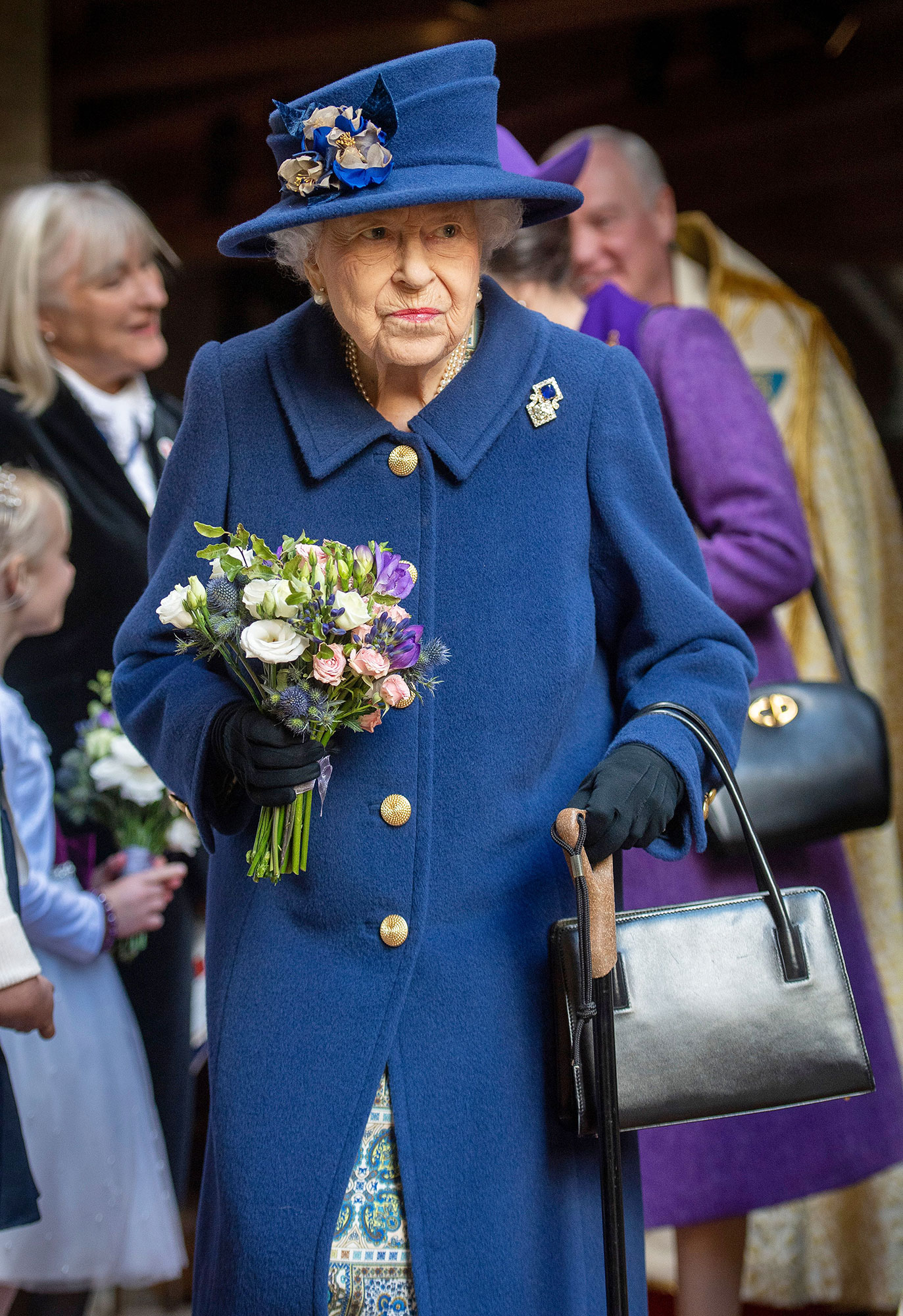 Queen Elizabeth II Uses Cane Attend Westminster Service