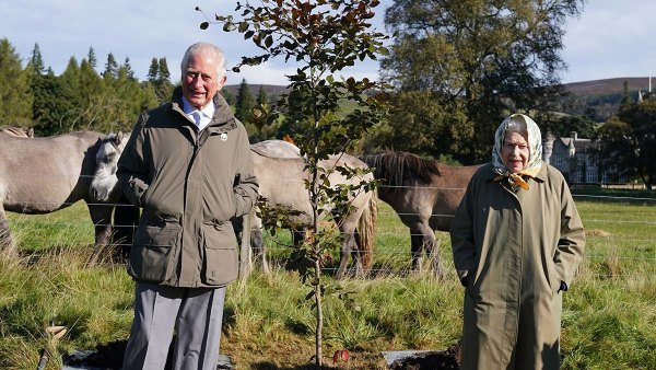 Queen Elizabeth Meets Local Schoolchildren During Outing With Prince Charles
