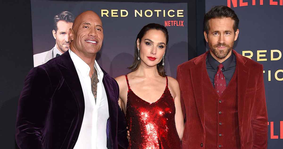 https://www.usmagazine.com/wp-content/uploads/2021/11/Color-Coordinated-Costars-Gal-Gadot-Ryan-Reynolds-and-Dwayne-The-Rock-Johnson-Match-at-Red-Notice-Premiere-Feature.jpg?crop=2px%2C0px%2C1443px%2C758px&resize=1200%2C630&quality=40&strip=all
