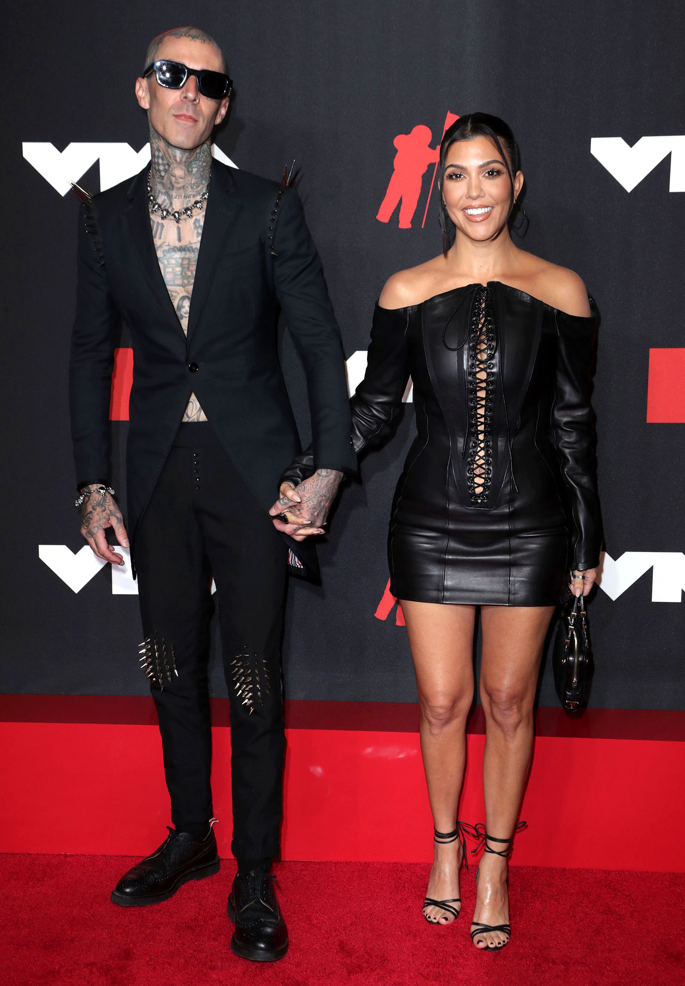 Inside Kourtney Kardashian and Travis Barker Holiday Trip to Disneyland With Kids