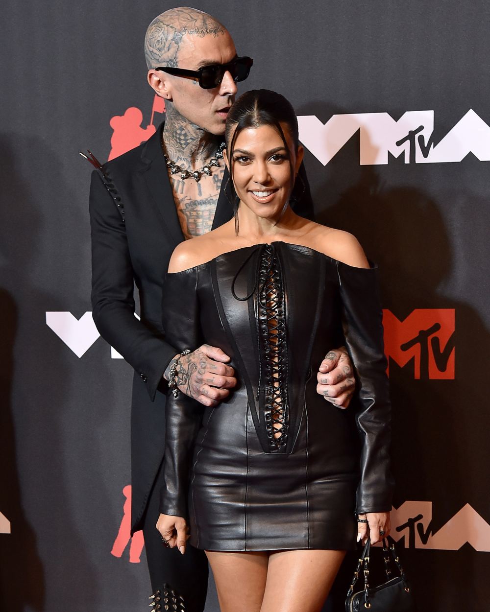 Kourtney Kardashian Unveils Family Gingerbread House for Travis Barker and Kids &mdash; Without Scott Disick