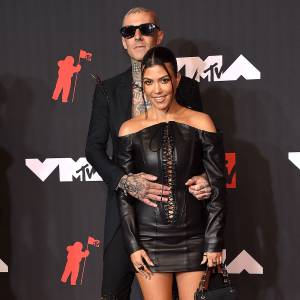 Kourtney Kardashian and Travis Barker Take PDA to Another Level With Christmas-Themed Foot Pic