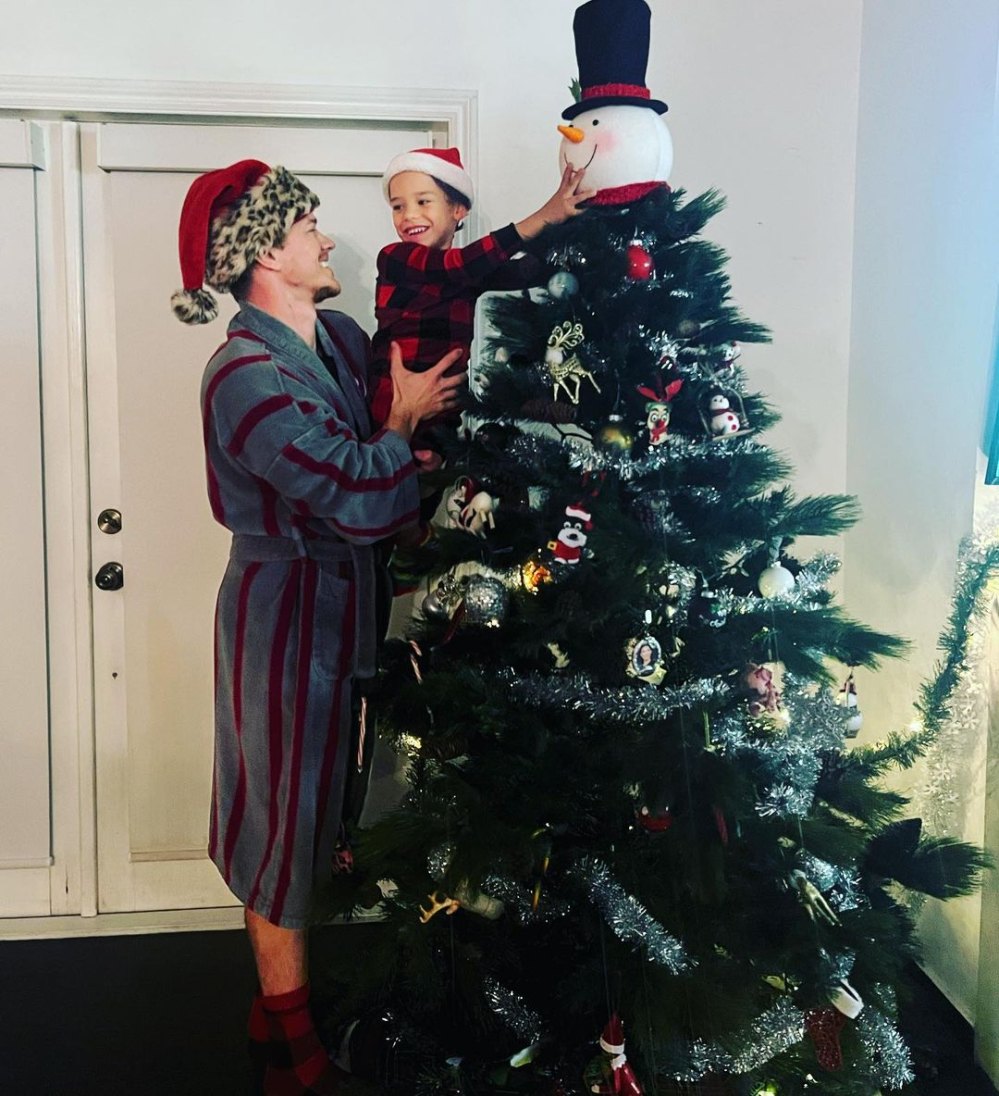 https://www.usmagazine.com/wp-content/uploads/2021/12/Perfect-Pair-Ryan-Dorsey-Decorates-Christmas-Tree-With-6-Year-Old-Son-Josey.jpg?w=1000&quality=86&strip=all