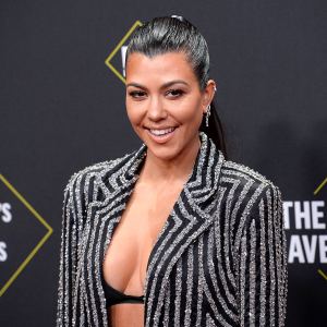 Kourtney Kardashian Just Shared a Throwback Bikini Pic From 2005 — and She Honestly Looks the Same