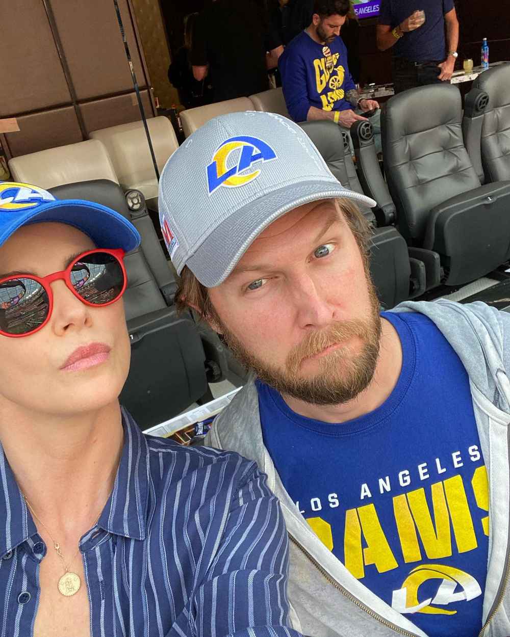 Charlize Theron Takes a Selfie With Mystery Man at Super Bowl