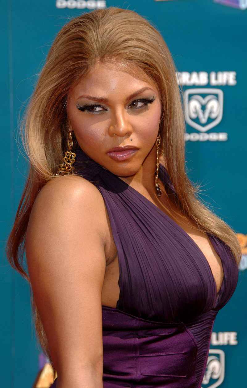 Lil' Kim: How Her Face Has Changed Through the Years 2008 BTA in purple dress