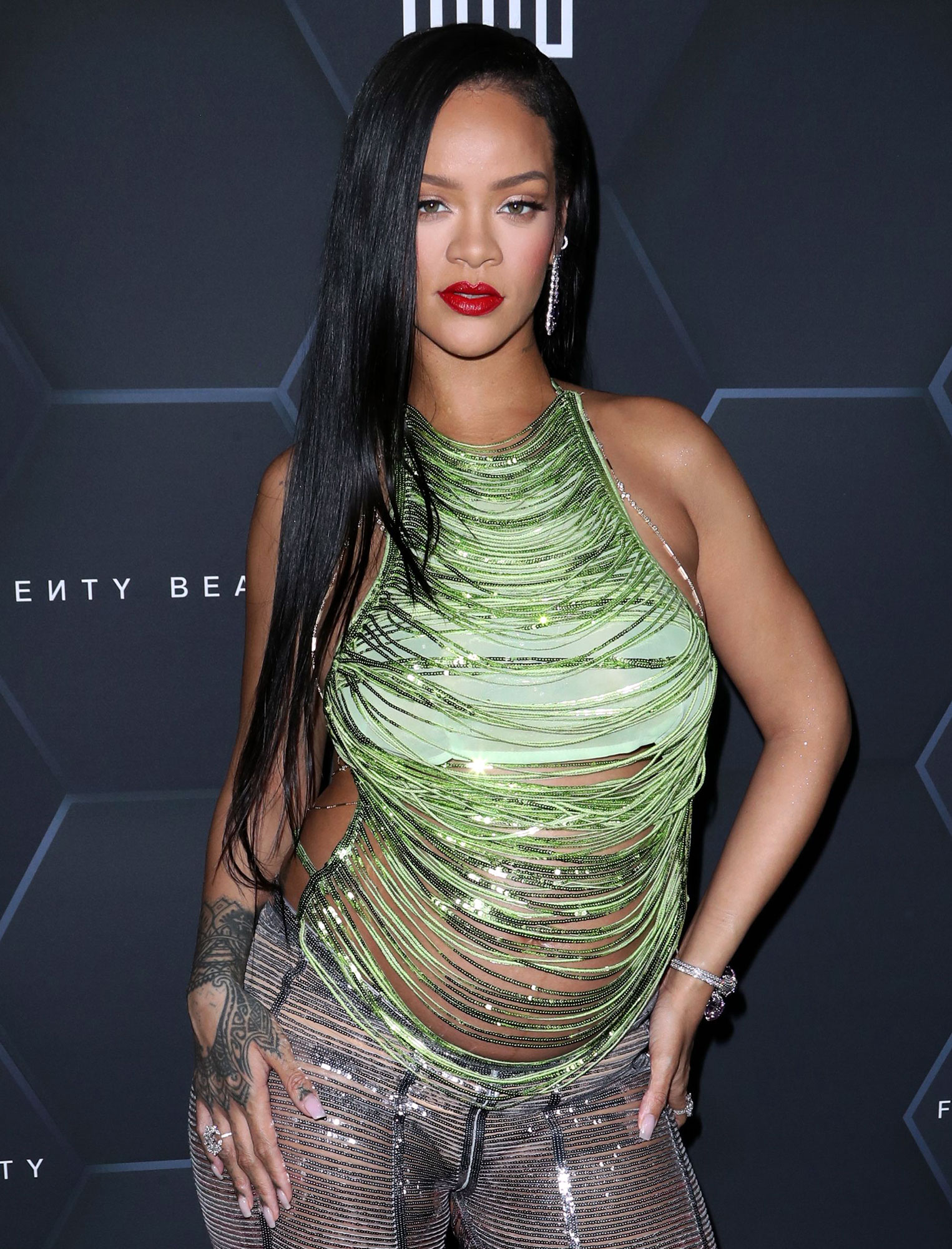 Pregnant Rihanna Puts Baby Bump On Display For Gucci Show