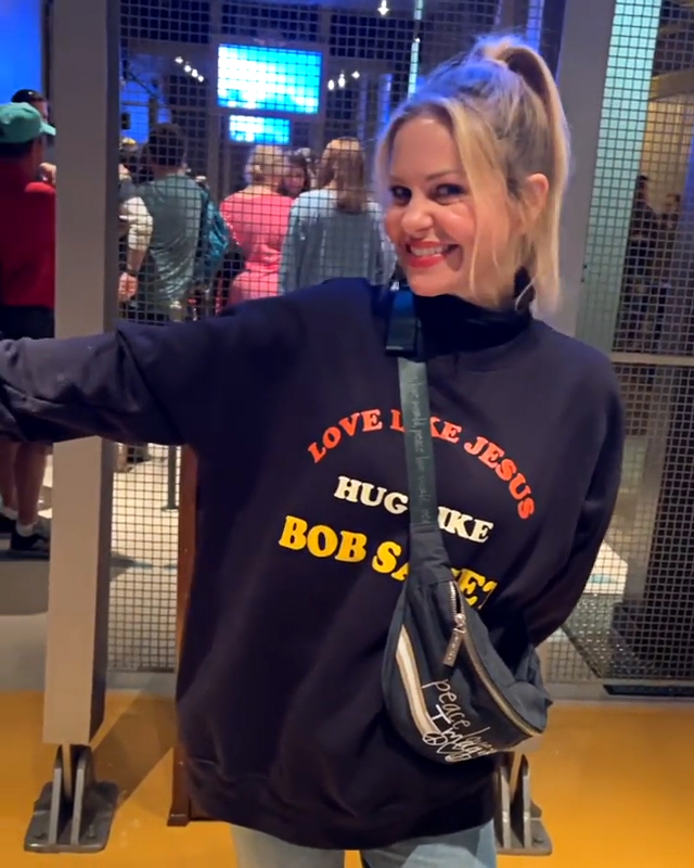 Candace Cameron Bure Wears 'Hug Like Bob Saget' Sweatshirt to Disneyland
