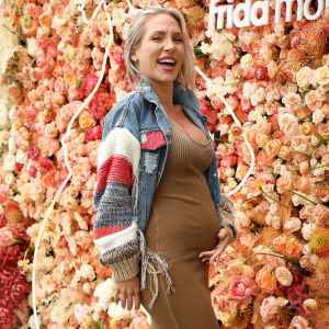 Pregnant Sharna Burgess Claps Back at Aggressive Troll Over Stretch Marks