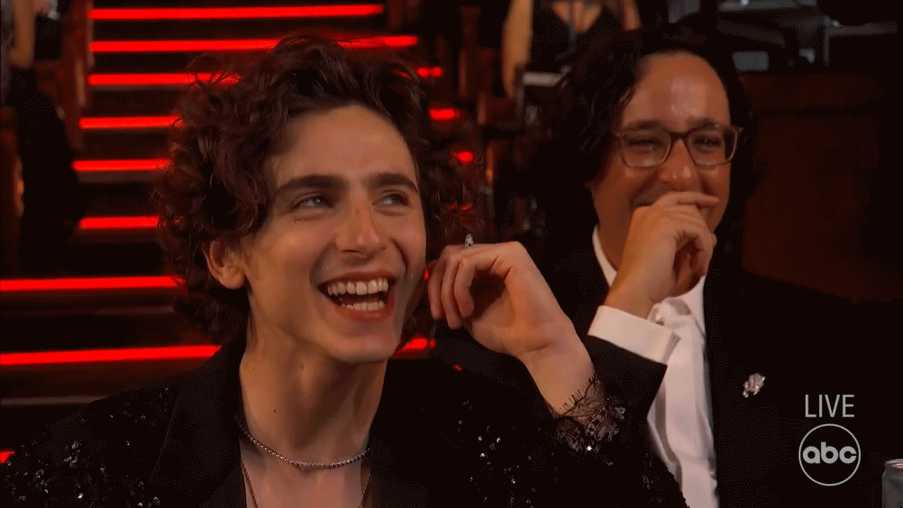 NEW PROMO: Timothee! Jake! See the Funniest Celeb Reactions at the Oscars 2022 Timothee Chalamet at the Oscars 2022 Hosts Regina Hall, Amy Schumer and Wanda Sykes couldn't hold back when the Dune star was in the audience at the 94th annual Academy Awards in March 2022. Schumer joked about how much he aged during the coronavirus pandemic, and the camera cut to J.K. Simmons. "You know what? I'd still smash," Hall said. The camera briefly showed the real Chalamet, who was chuckling from his seat.