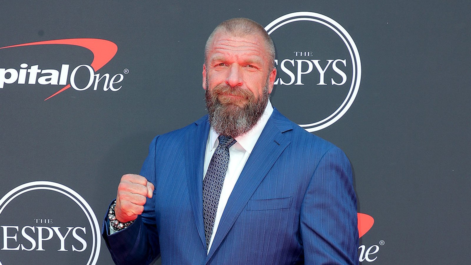 https://www.usmagazine.com/wp-content/uploads/2022/03/WWE-Star-Paul-Triple-H-Levesque-Says-He-Will-Never-Wrestle-Again-After-Suffering-Heart-Failure-and-Undergoing-Surgery-Retire.jpg?crop=94px%2C0px%2C1239px%2C700px&resize=1600%2C900&quality=86&strip=all