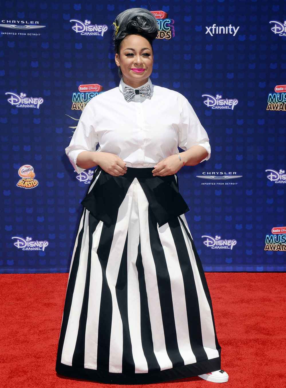 Raven-Symone’s Weight Loss Journey Through the Years: Photos | Us Weekly