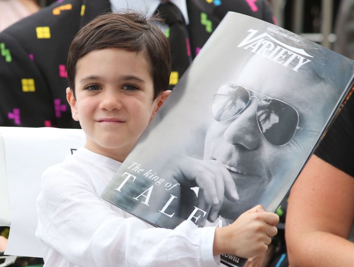 Simon Cowell says Eric 8's son was hysterical over his face filling