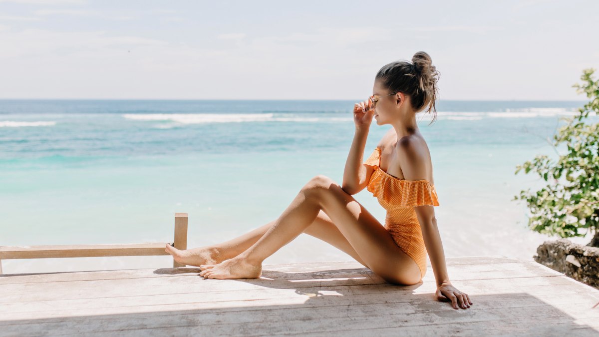 Woman-Wearing-Bathing-Suit-Stock-Photo