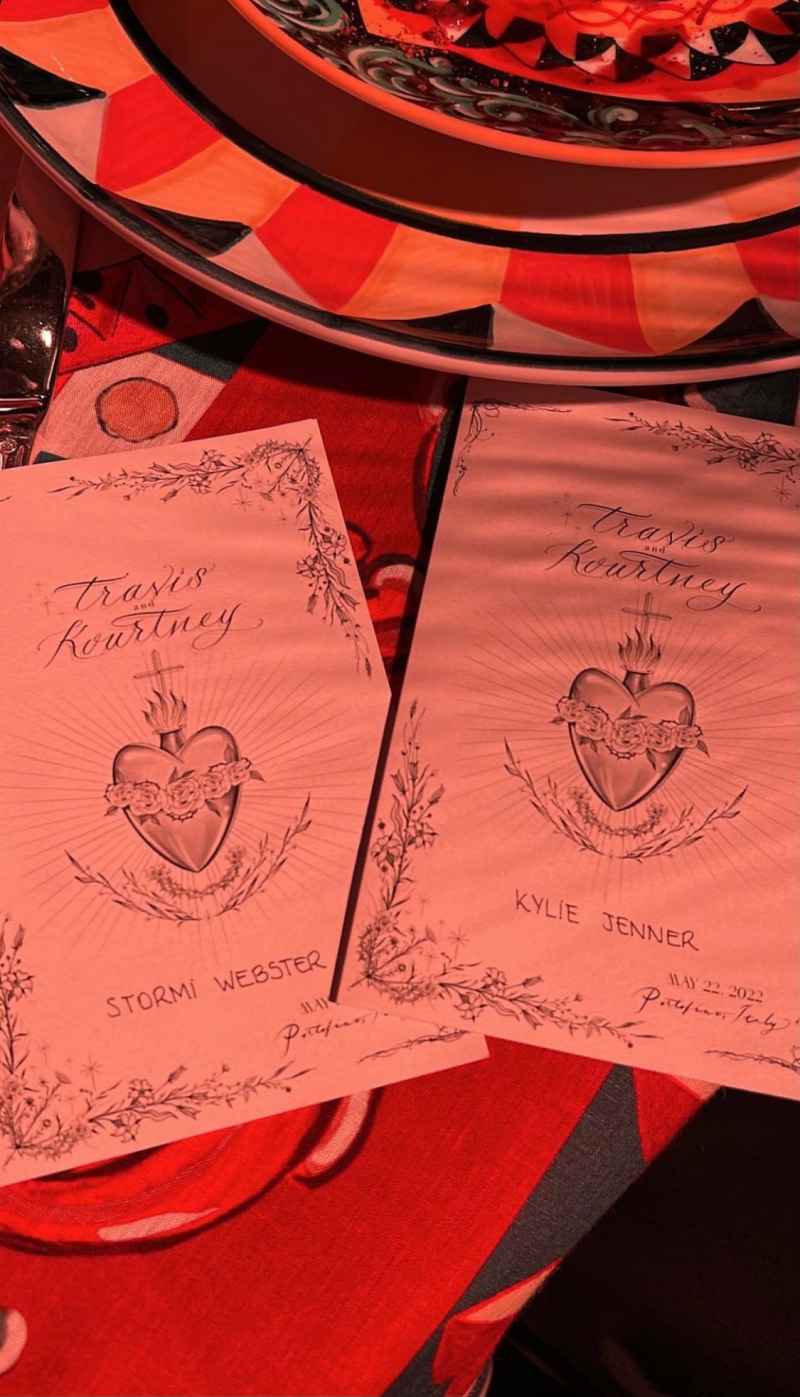 Kylie Jenner shares Kourtney and Travis wedding programs with sacred heart image