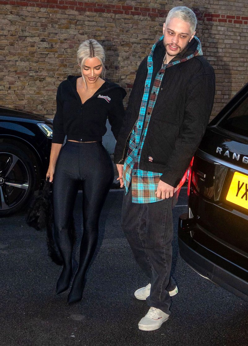 Kim Kardashian Holds Pete Davidson Tight as They Arrive in London 4