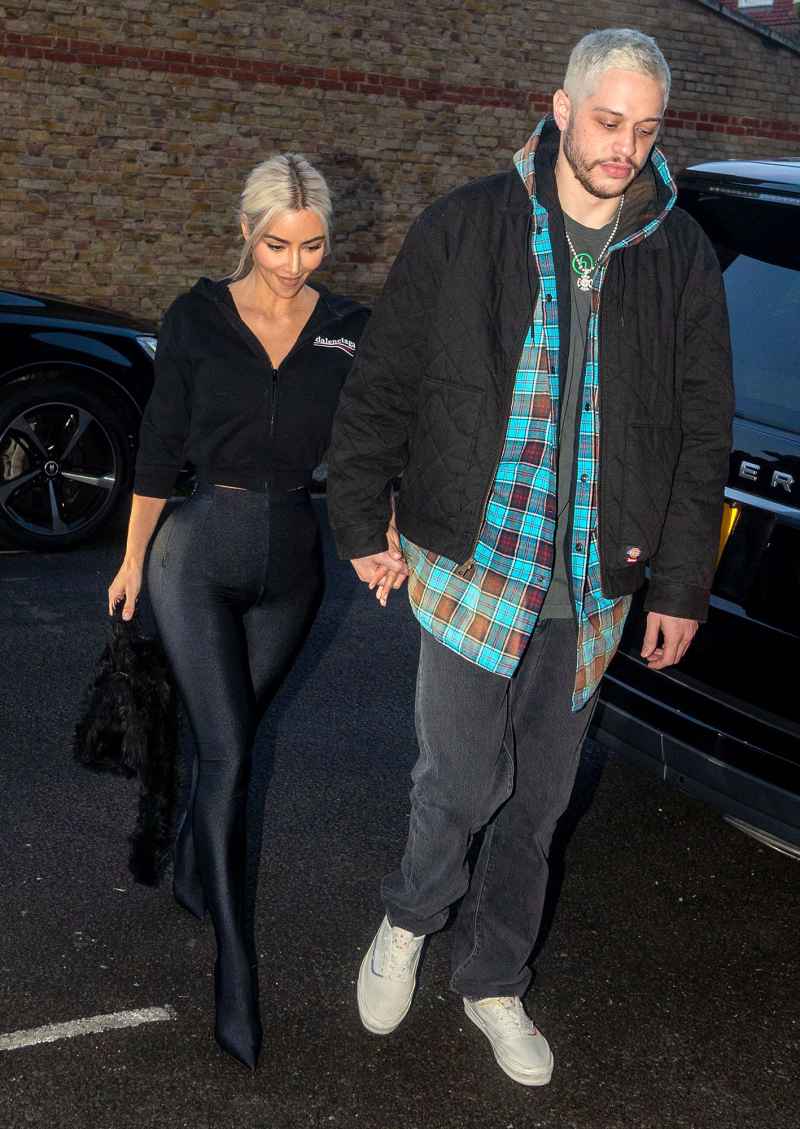 Kim Kardashian Holds Pete Davidson Tight as They Arrive in London 6
