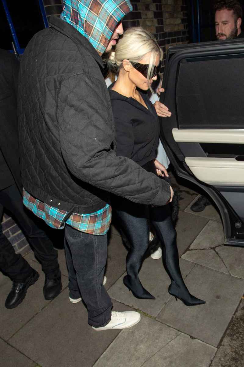Kim Kardashian Holds Pete Davidson Tight as They Arrive in London
