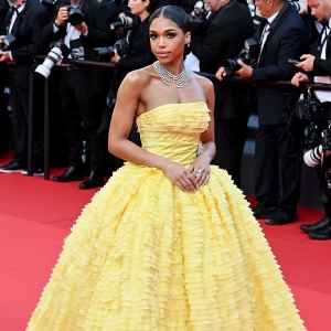 Lori Harvey Says She Felt Like 'Belle' as She Made Her Cannes Debut in Yellow Ruffled Gown