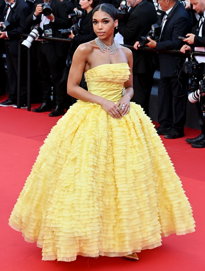Lori Harvey Says She Felt Like 'Belle' as She Made Her Cannes Debut in Yellow Ruffled Gown