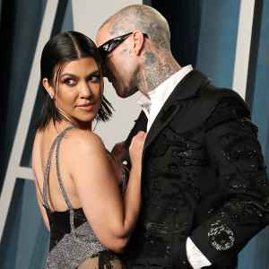 Travis Barker Bites Wife Kourtney Kardashian’s Feet in Steamy Wedding Photos: 'Cheers to Forever'