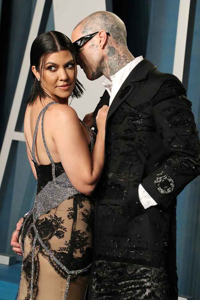 Travis Barker Bites Wife Kourtney Kardashian’s Feet in Steamy Wedding Photos: 'Cheers to Forever'