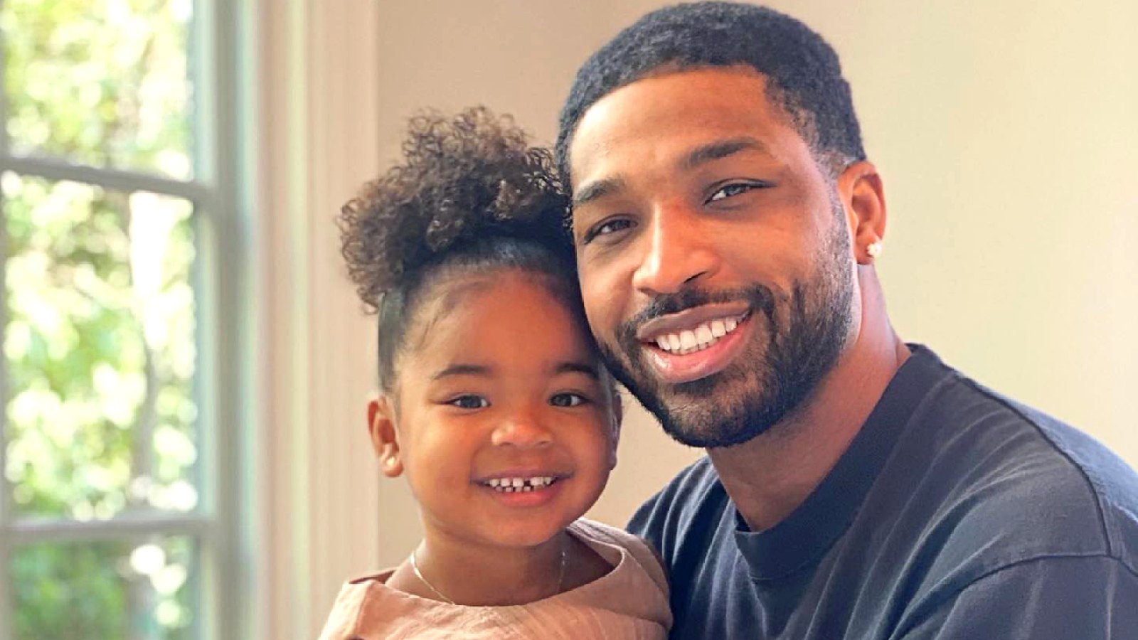 Tristan Thompson Twins With Daughter True While Khloe Kardashian Travels to Italy for Kourtney and Travis' 3rd Wedding