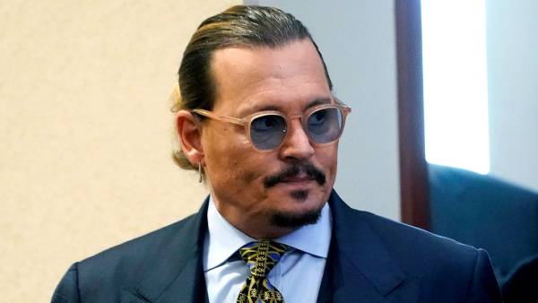 Woman Claims Johnny Depp Fathered Her Baby in Amber Heard Trial Outburst