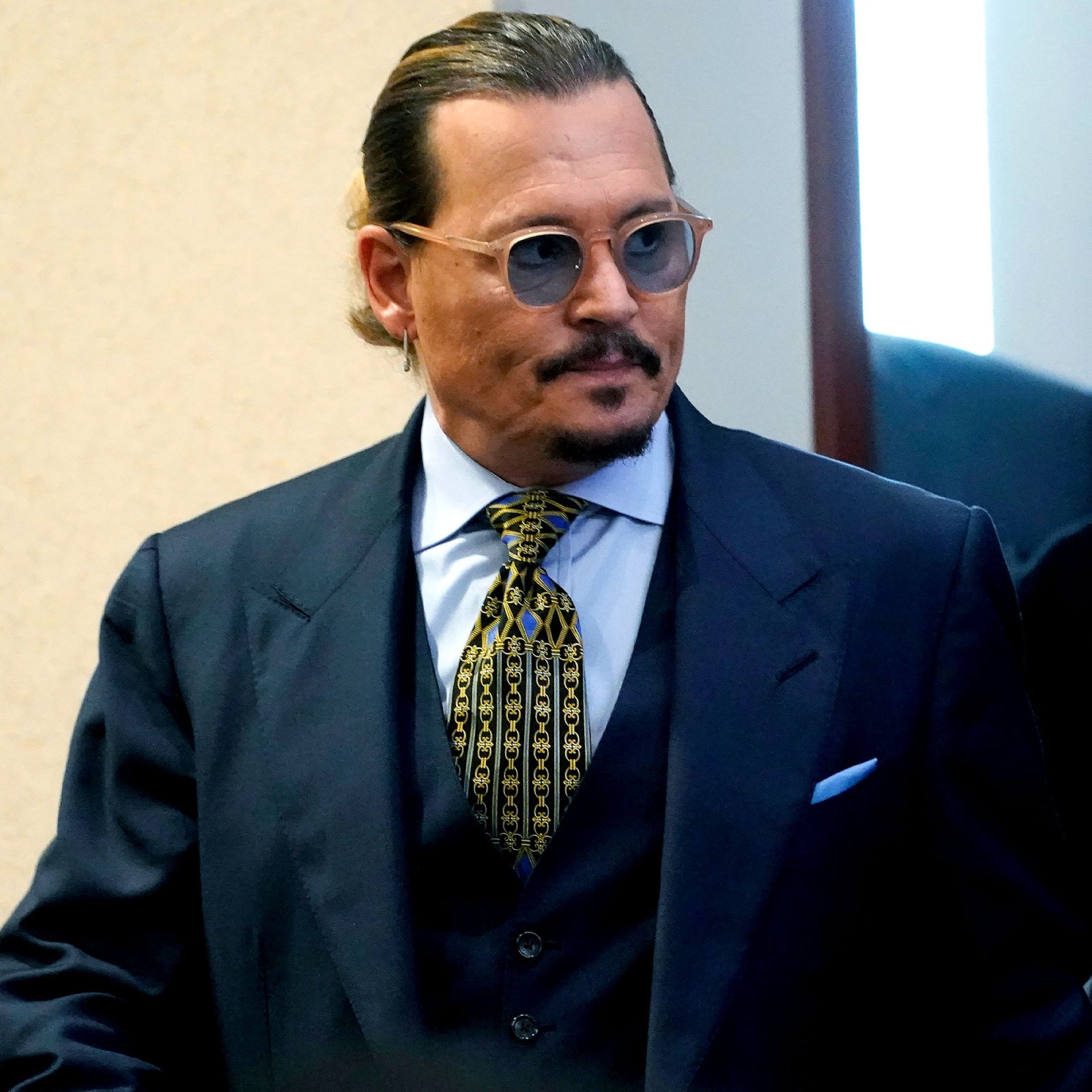 Woman Claims Johnny Depp Fathered Her Baby in Trial Outburst