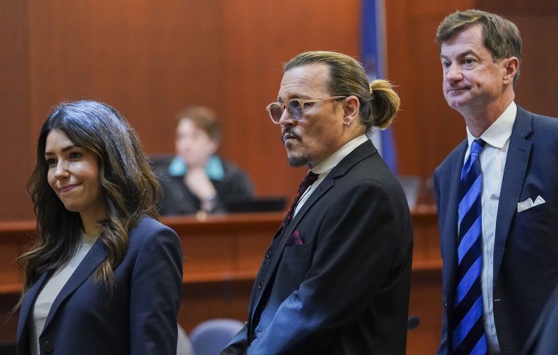 Johnny Depp with his lawyers