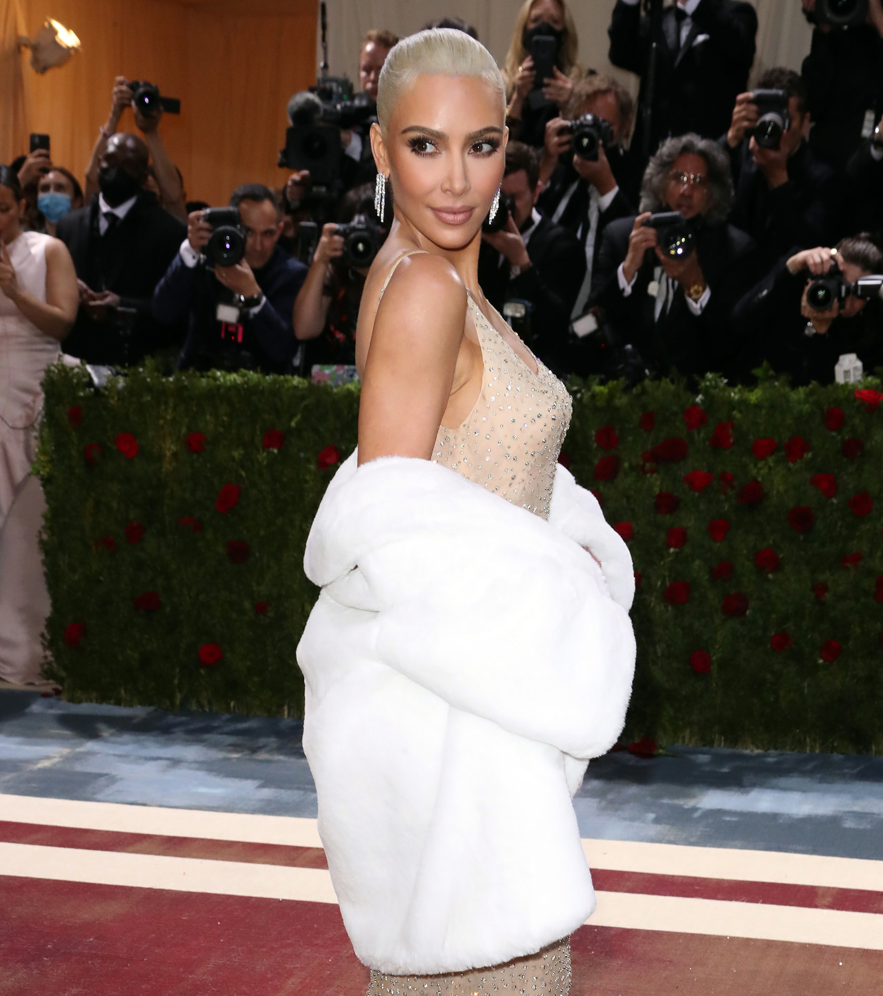 Kim Kardashian accused of 'ripping off' lesser-known designer's entire  outfit for new Skims New Year's Eve dress