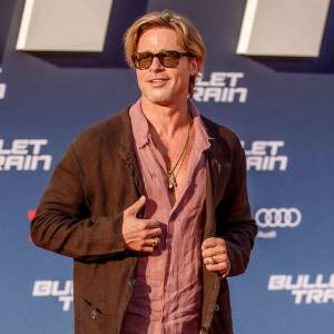 Brad Pitt Shows Off Tattoos