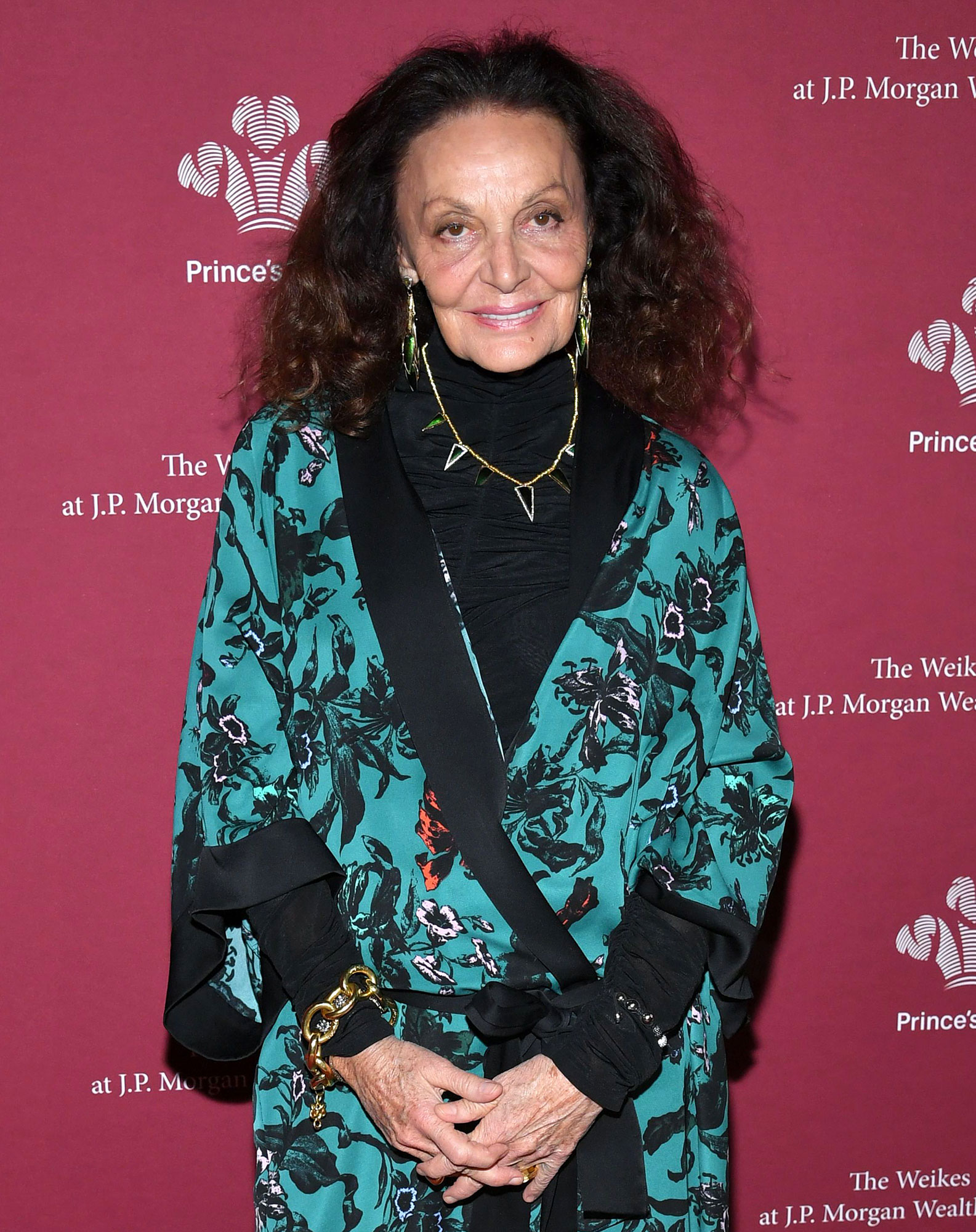 Diane von Fürstenberg Wows in High Cut Red Swimsuit