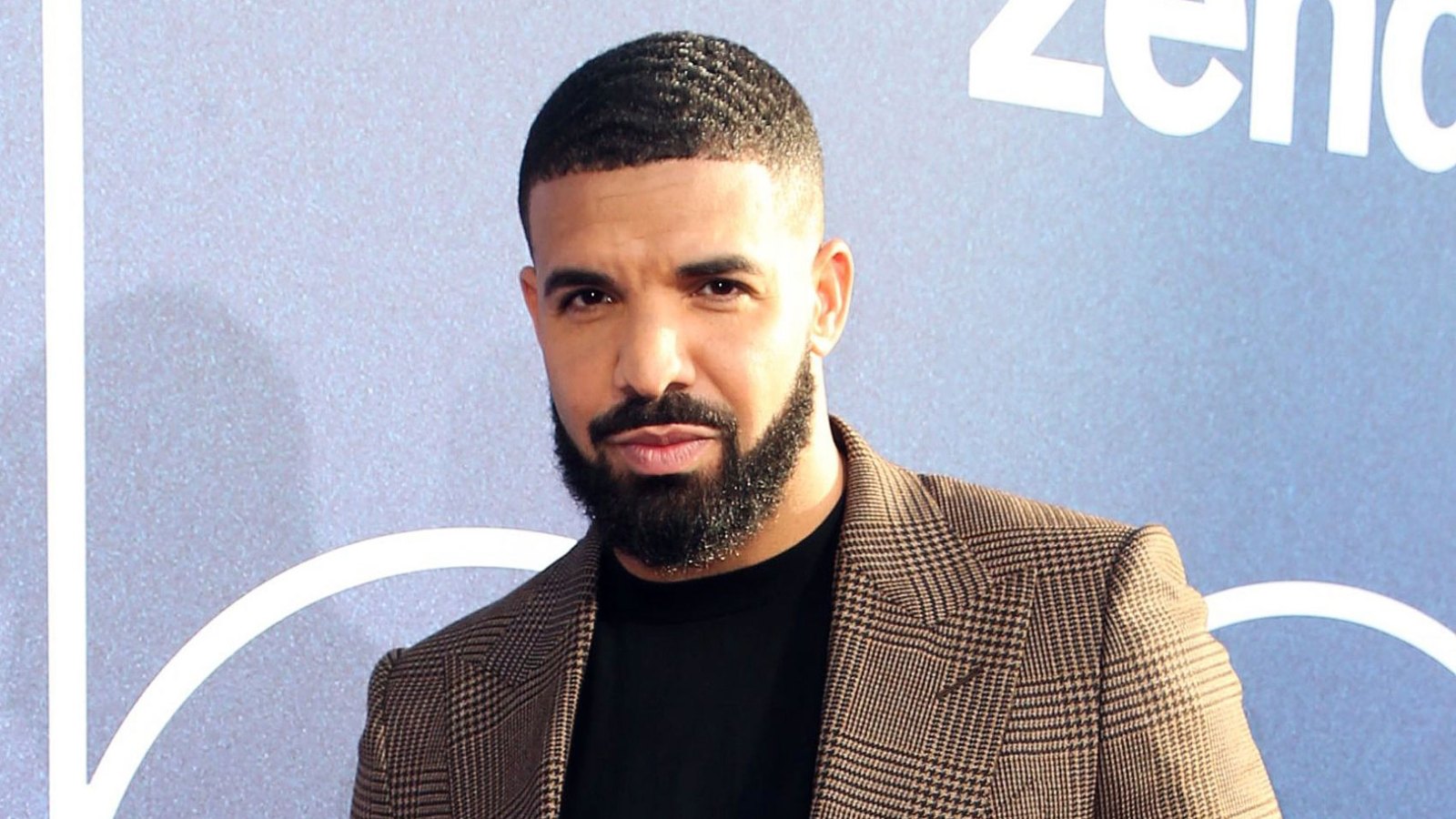 Drake Still Isn't a Fan of the Tattoo His Dad Got of His Face in 2017