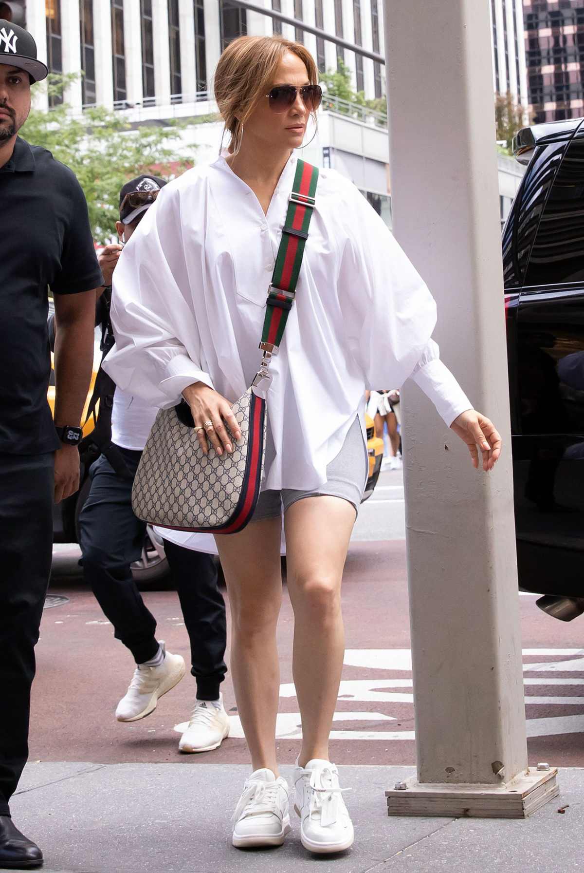 Jennifer Lopez Rocks Oversized Button-Up, Biker Shorts in NYC