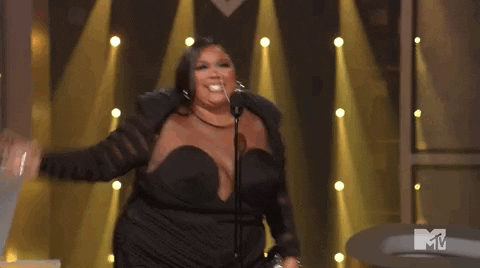 Lizzo Accepting Award VMAs 2022 What You Didn't See on TV MTV Movie TV Awards 2022
